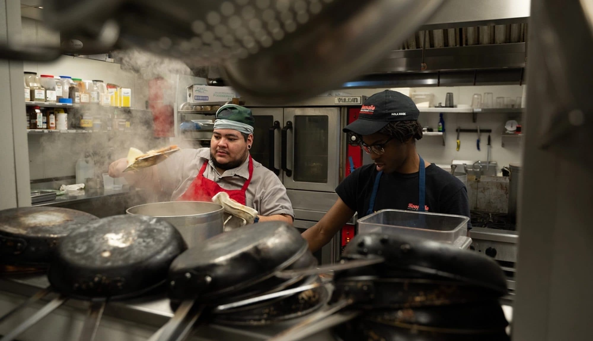 Chefs working a professional kitchen service